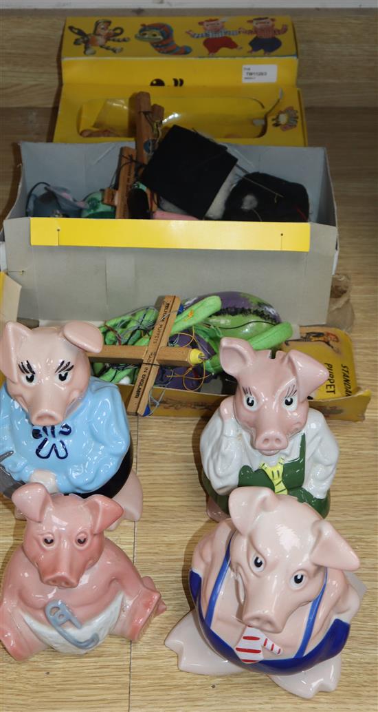 Seven Pelham puppets, including Mickey Mouse and Pluto (a.f.) and a group of four NatWest money box pigs